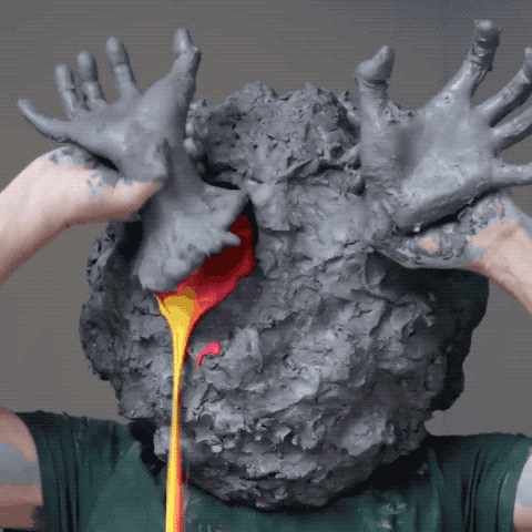 Gif excerpt from 'Will.yo.soy' (2021), of Cobbing pulling sculpted clay hands off his roughly formed clay head to unleash a flood of brightly colored paint from behind each one.