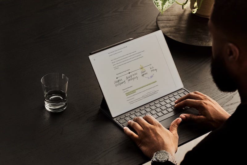 A man typing on the Folio Keyboard with the reMarkable Paper Pro