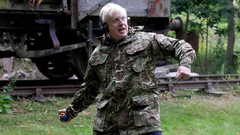Boris Johnson throws a grenade as he visits Ukrainian troops being trained  in UK | Politics News | Sky News