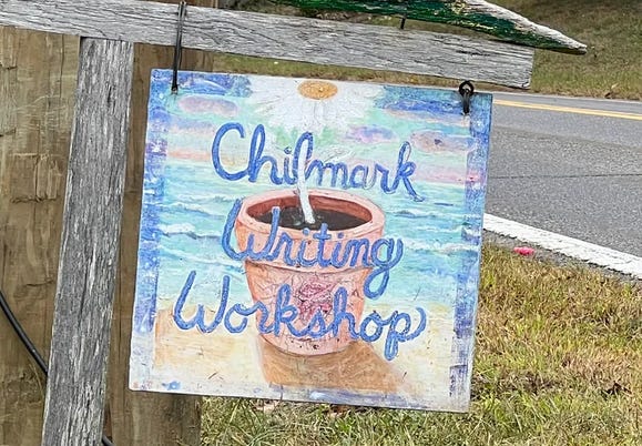 Wooden sign outside of Chilmark Writing Workshop