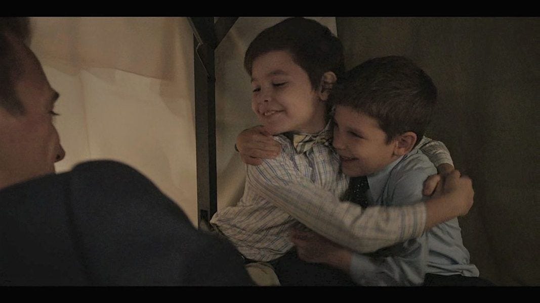 CAught in the act! Jake Abel under table with two very young boys on Walker set TMZ.