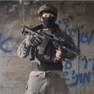 Masked Israeli reservist threatening slaughter in Gaza