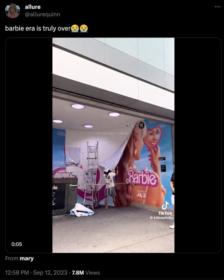 "barbie era is truly over" text next to a video of the barbie move poster being taken down