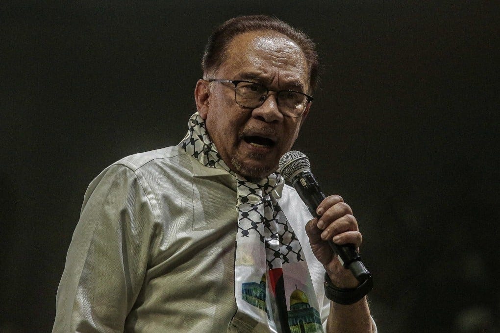 Malaysian Prime Minister Anwar Ibrahim delivers a speech to the crowd during a ‘Malaysia Stands with Palestine’ rally in Kuala Lumpur last year. Photo: EPA-EFE