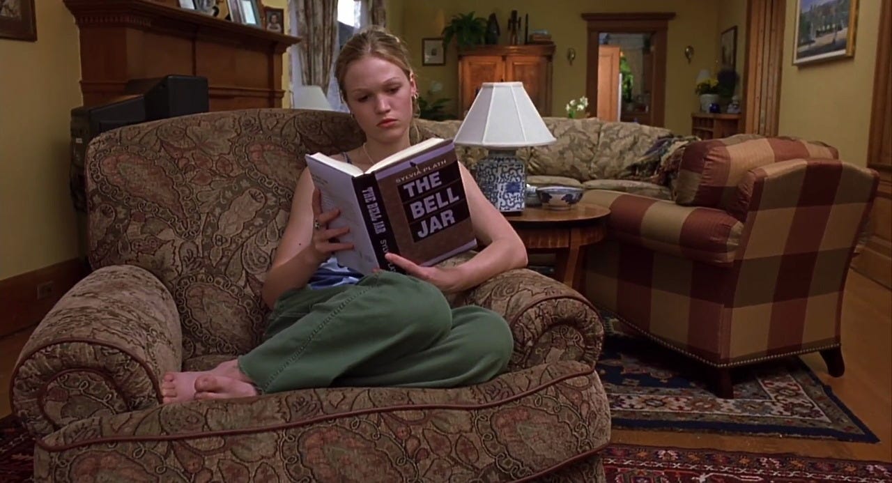 Still from the movie 10 Things I Hate About You. Kat, the main character, is reading The Bell Jar by Sylvia Plath