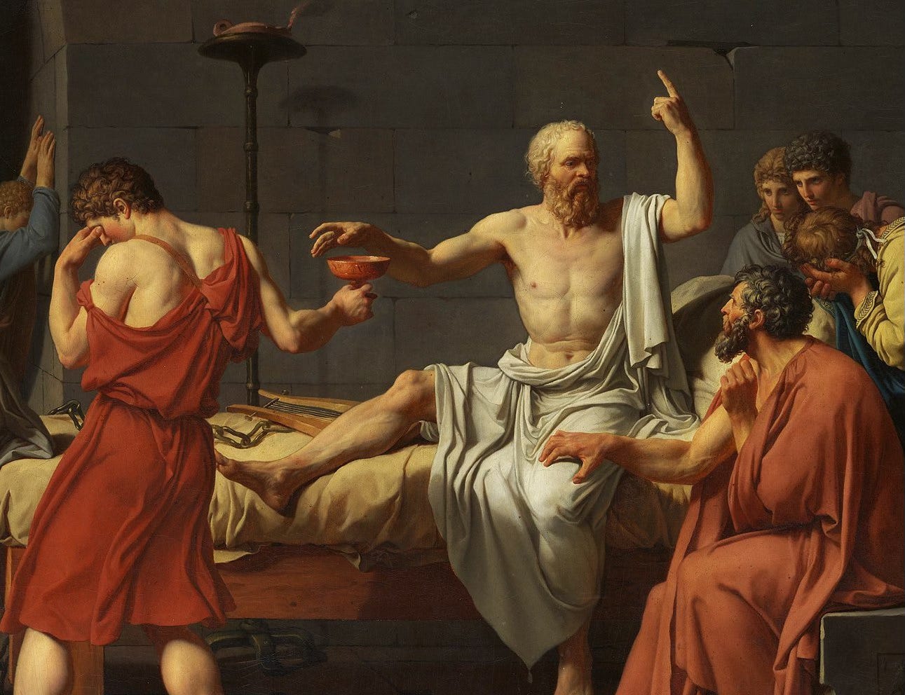 Photo of David's painting of Socrates, surrounded by supporters, reaching for the hemlock. 