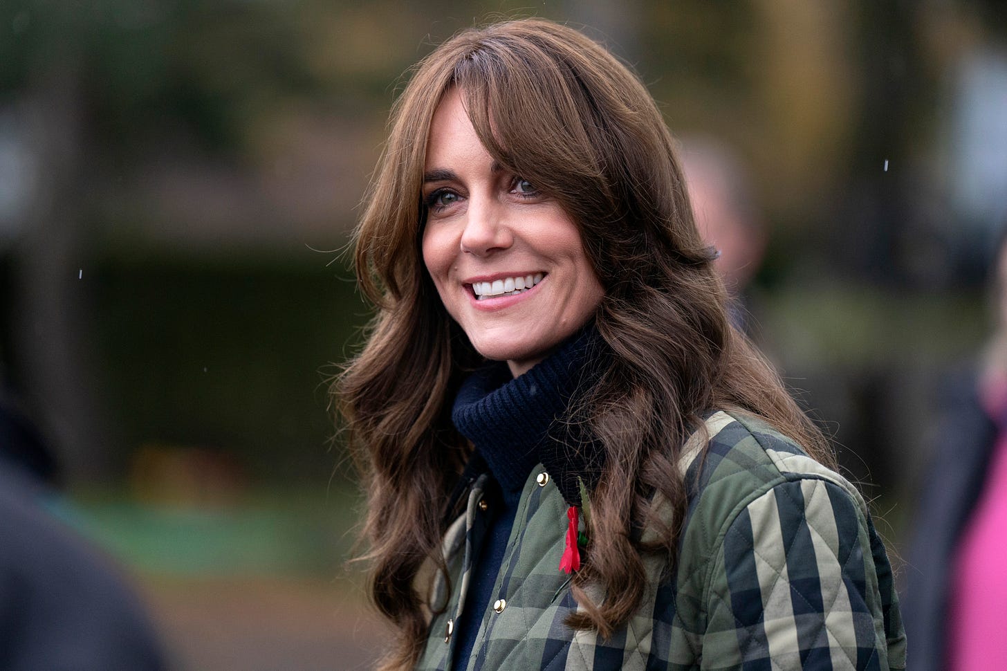 Princess Kate wearing quilted jacket smiling