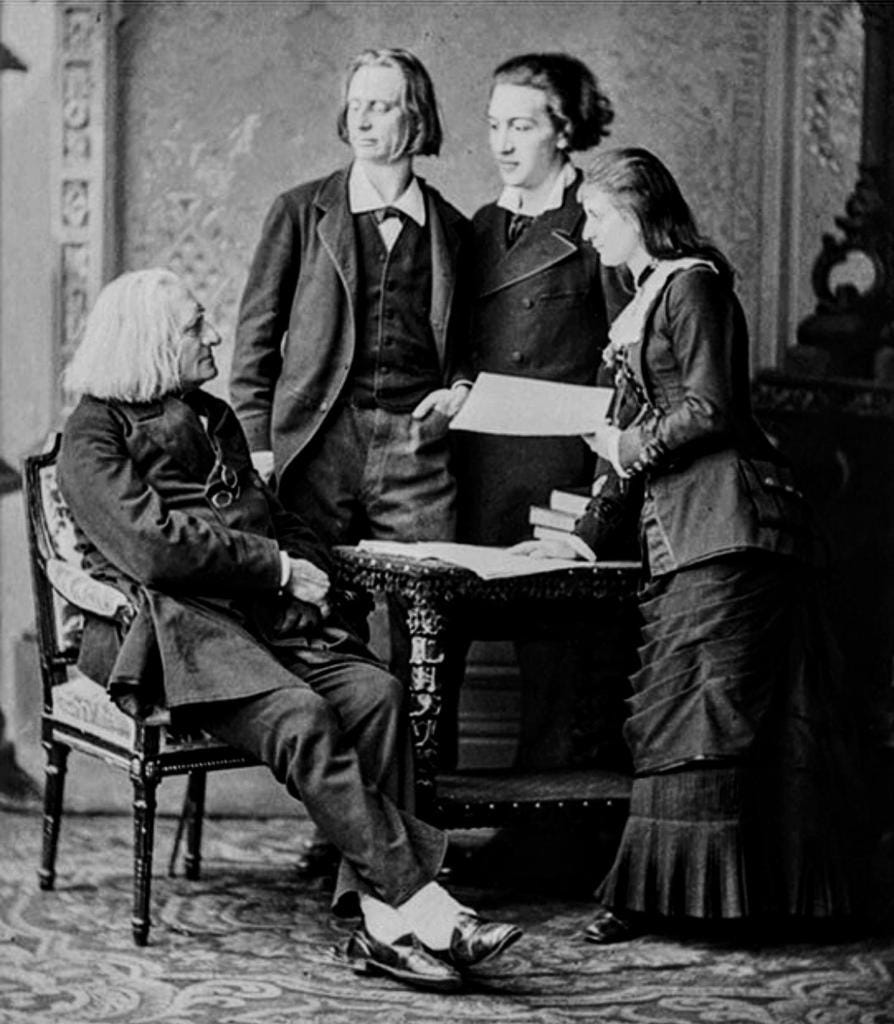 image of Franz Liszt with his students, teaching them.