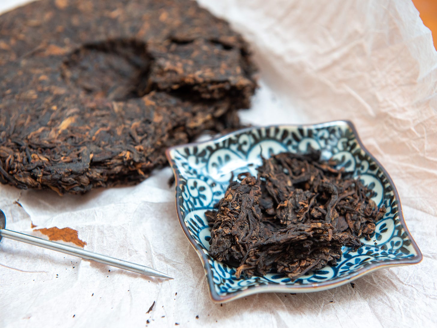 ID: Flaked off portion of Smokeshou ripe puer