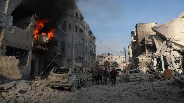 Syria targets rebels after surprise siege of Aleppo