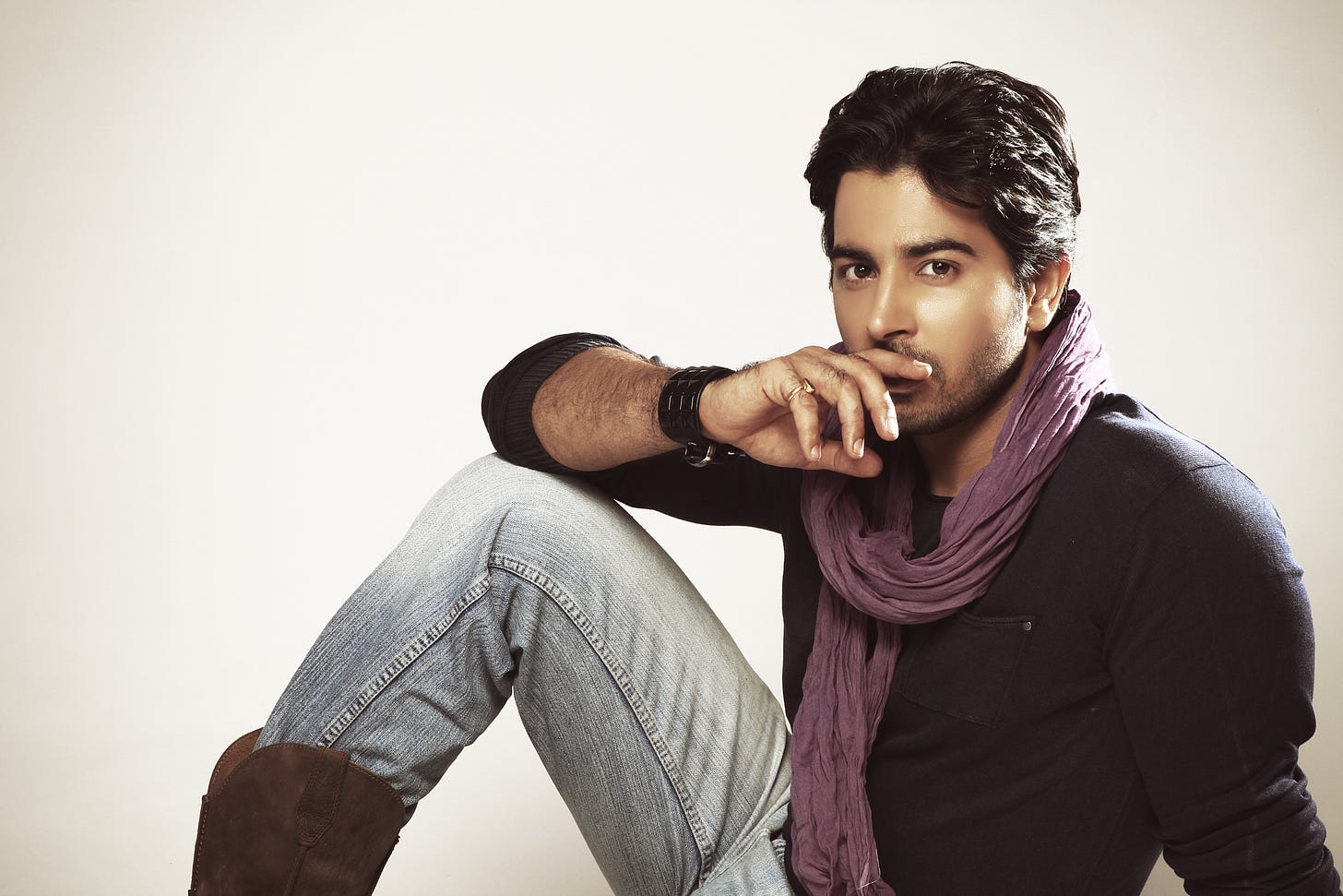 Free Man Wearing Purple Scarf and Black Long-sleeved Shirt Stock Photo