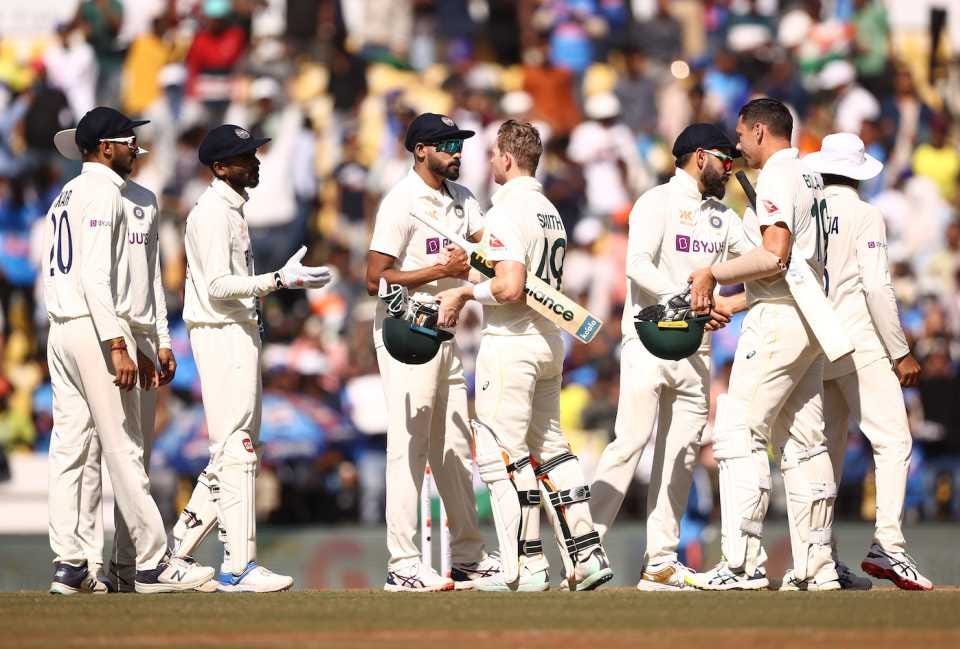 The players greet each other after India's innings victory