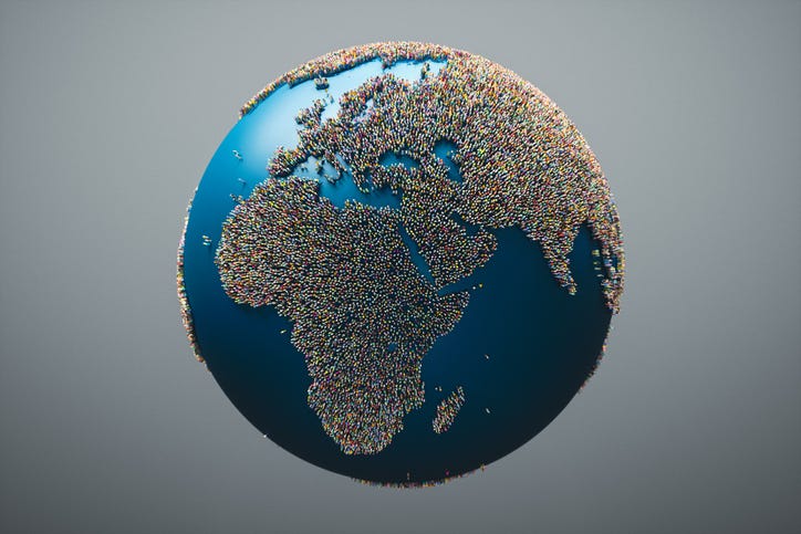 photo of people on globe