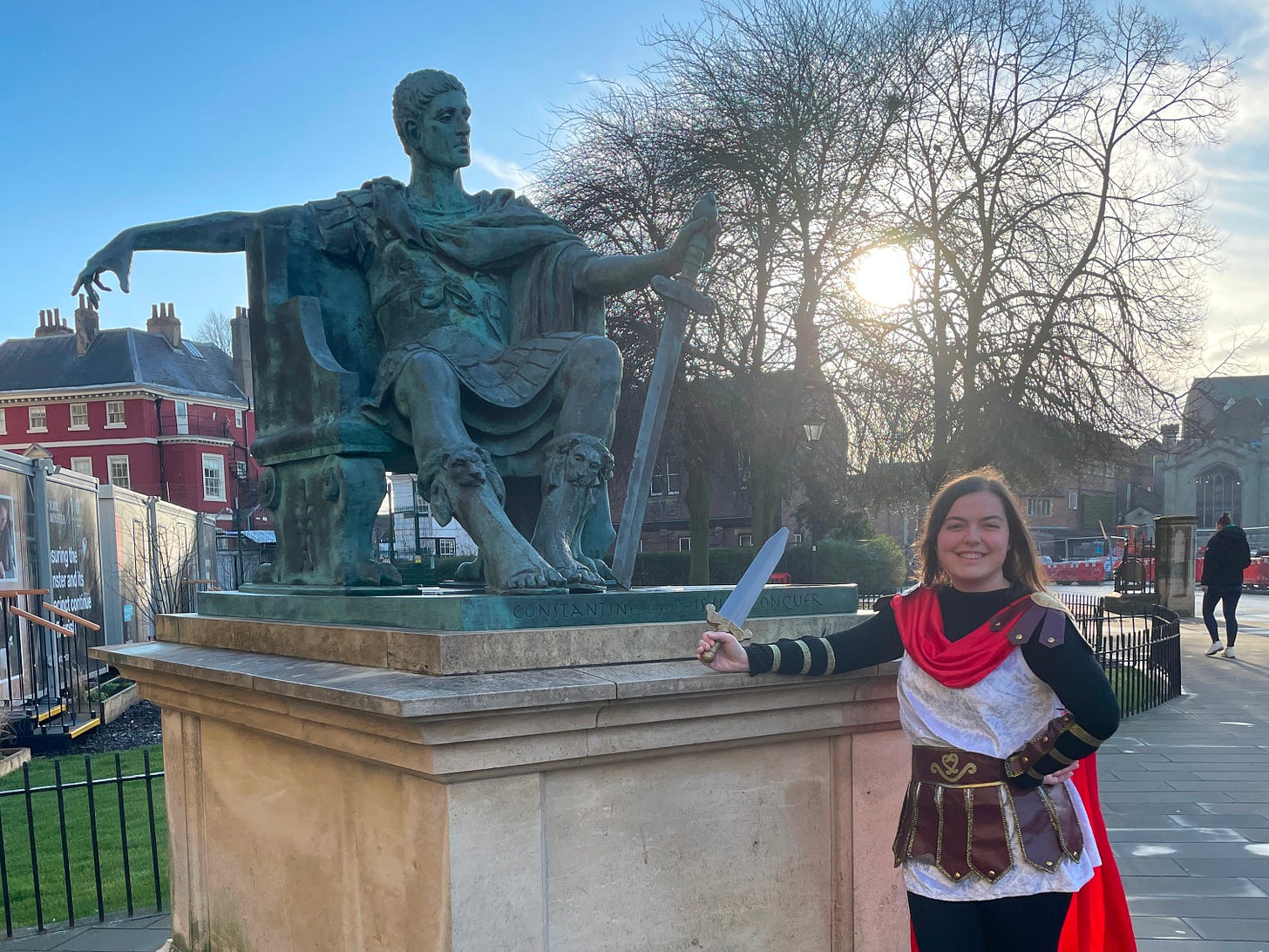 Photo of Ellen an Online Latin Tutor next to a statue of the Roman Emperor Constantine The Great In York