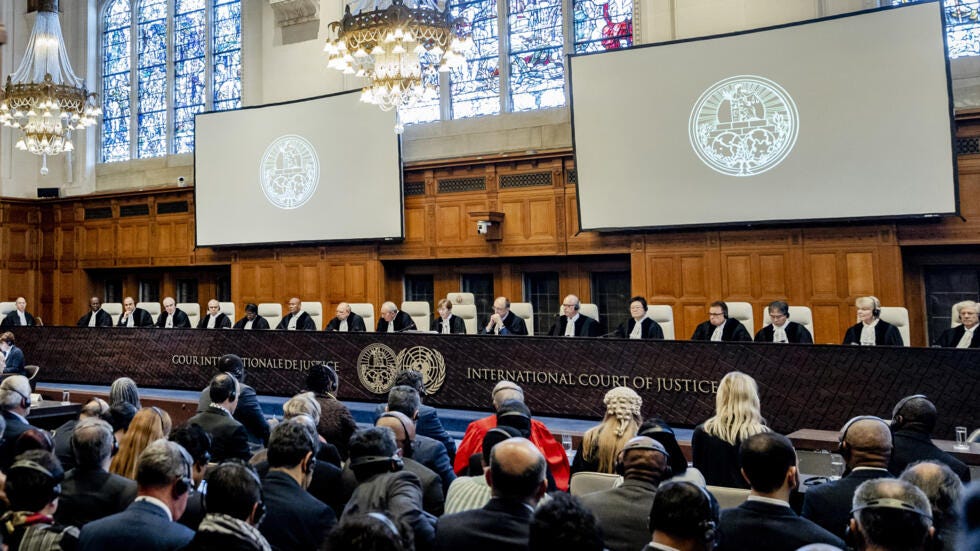 ICJ President Joan Donoghue (C) speaks at the International Court of Justice (ICJ) prior to the verdict announcement in the genocide case against Israel, brought by South Africa, in The Hague on Janua