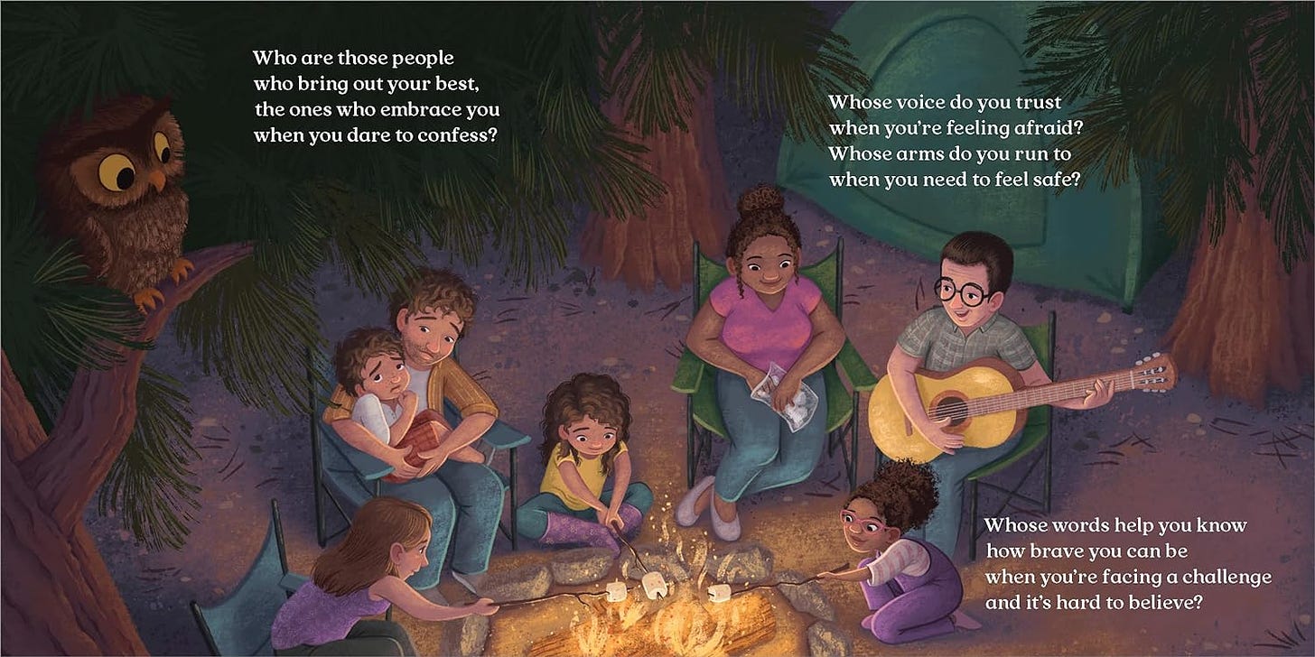 A spread from You Will Always Belong shows people gathered around a campfire in the woods. Someone plays the guitar and an owl looks on from the treetops.