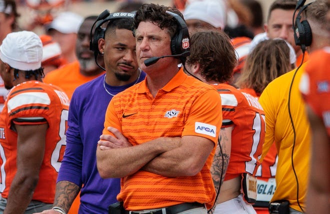 Oklahoma State coach Mike Gundy watches his team's game against South Dakota State at Boone Pickens Stadium.