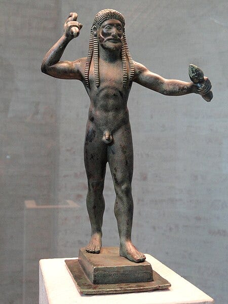  Zeus hurling lightning, archaic bronze statuette.