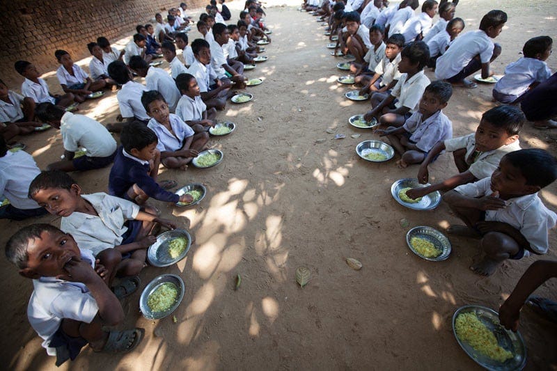 Dinners in this school near Ranchi in Jharkhand province, India, are subsidised by an aid agency working on nutrition and health. Under Informed Consent rules, the parents of the children in the picture would all have to be talked to in order for them to give their consent for this photo to be taken or used, it's not feasible to do that. Photo by Sean Hawkey. Dinners in this school near Ranchi in Jharkhand province, India, are subsidised by an aid agency working on nutrition and health. Under Informed Consent rules, the parents of the children in the picture would all have to be talked to in order for them to give their consent for this photo to be taken or used, it's not feasible to do that. Photo by Sean Hawkey.