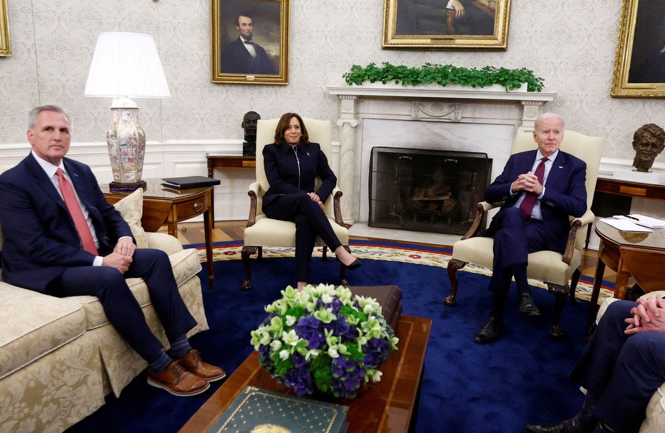 President Biden hosts debt limit talks with House Speaker Kevin McCarthy (R-Calif.), Vice President Harris and other congressional leaders in the Oval Office at the White House on May 16. (Evelyn Hockstein/Reuters)