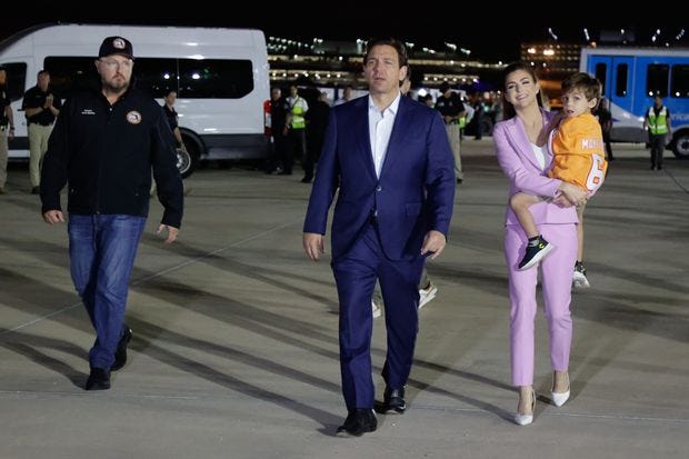 Florida Gov. Ron DeSantis greeted passengers arriving from Israel on a chartered flight organized by Project Dynamo on Sunday, Oct. 15, 2023, in Tampa. The flight landed at Tampa International Airport with 270 evacuees rescued by Project Dynamo from Israel including 91 children and four dogs. 