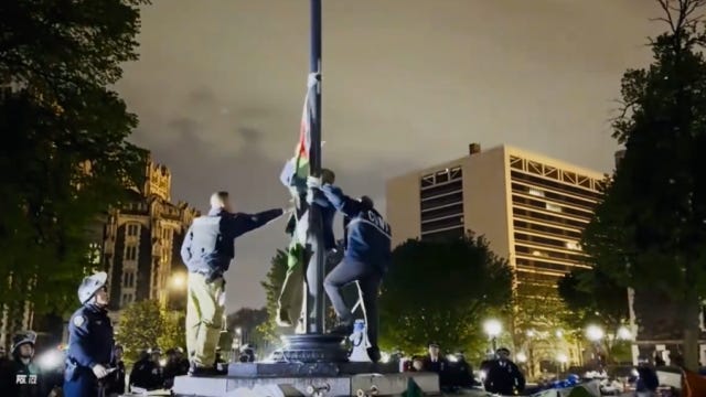 NYPD cops take down Palestinian flag, put up American flag at City Collge:  video