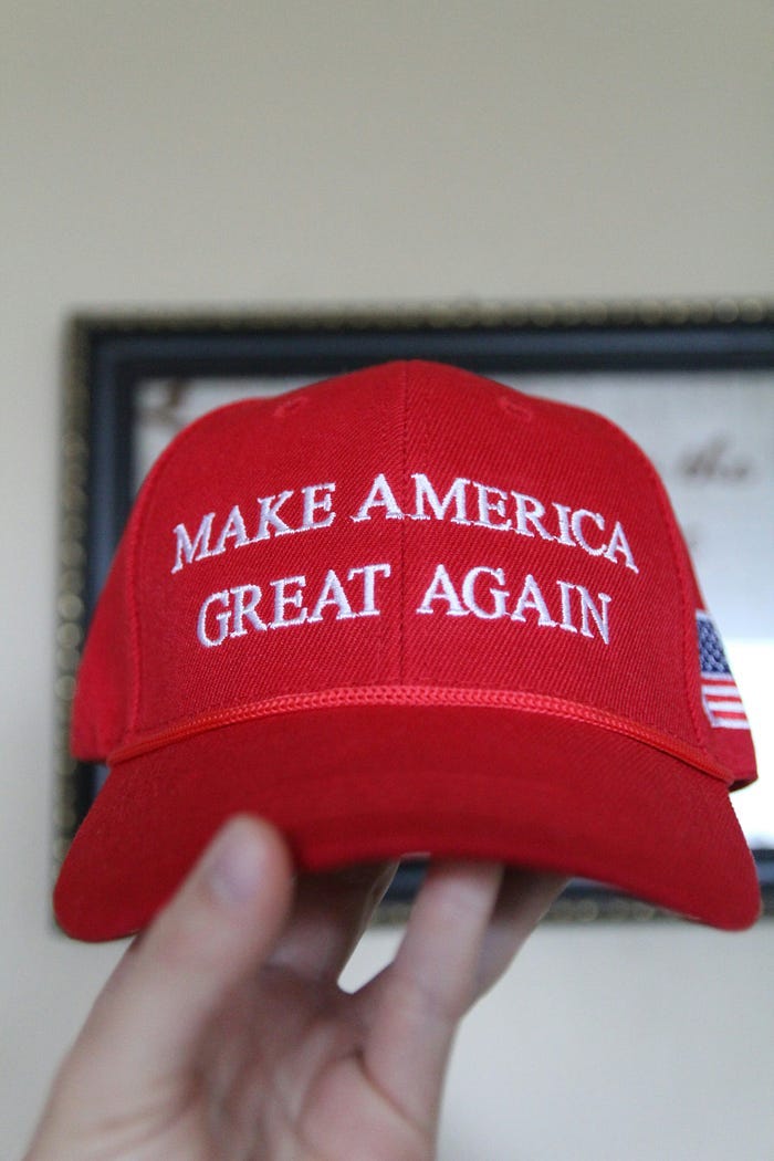 A red MAGA hat, such as might be worn by supporters of Donald Trump. His racist anti-immigrant rhetoric makes him a popular figure in far-right circles. A red MAGA hat, such as might be worn by supporters of Donald Trump. His racist anti-immigrant rhetoric makes him a popular figure in far-right circles.