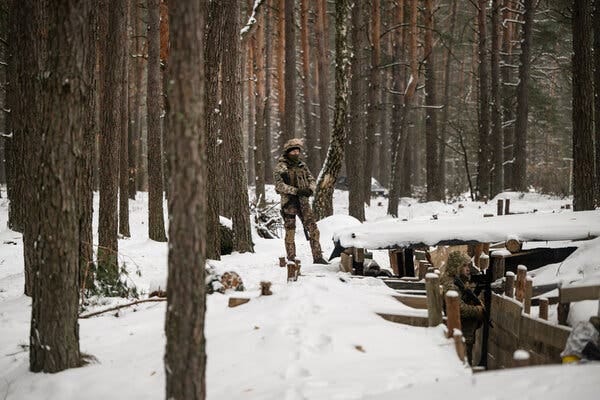 Ukrainian soldiers in defensive positions near the Belarusian border with northern Ukraine on Friday. Both Ukraine and Russia seem to be preparing for spring offensives.