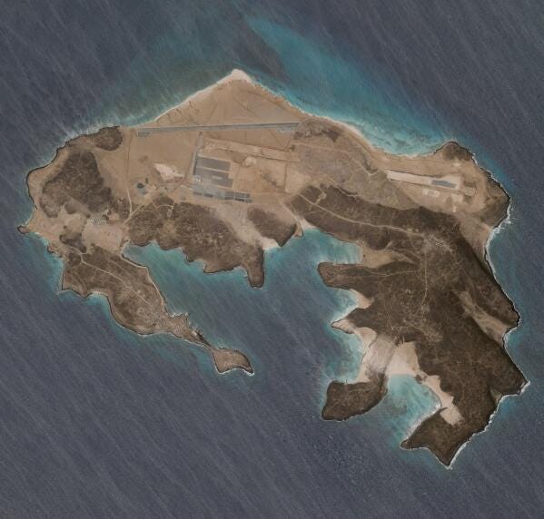 A mysterious air base is seen being built on Yemen's volcanic Mayun Island in this April 11, 2021 satellite photograph from Planet Labs Inc. The air base is in one of the world’s crucial maritime chokepoints for both energy shipments and commercial cargo. Officials in Yemen’s internationally recognized government say the United Arab Emirates is behind the effort. (Planet Labs Inc. via AP)