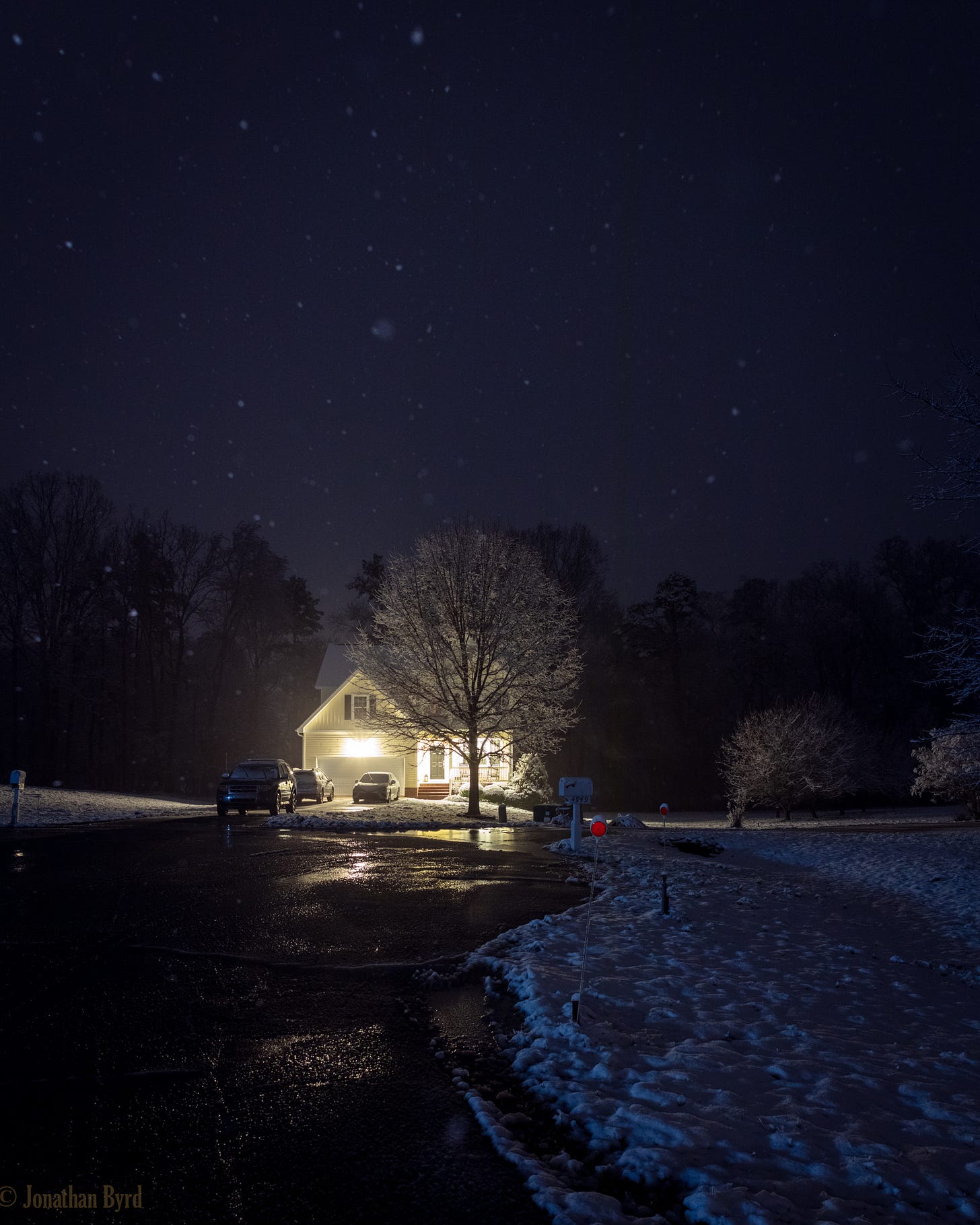 A house at night in the snow