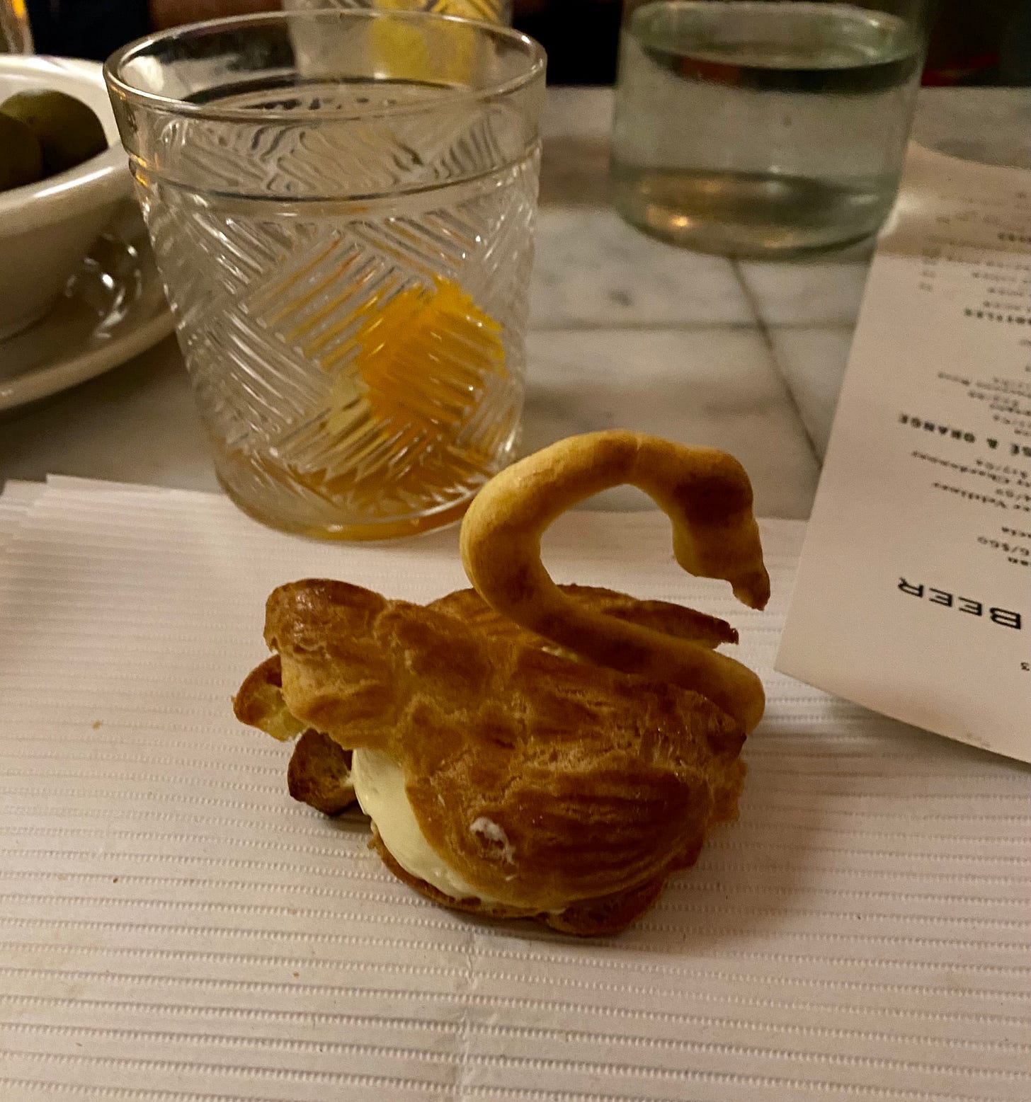 a cream puff shaped like a swan