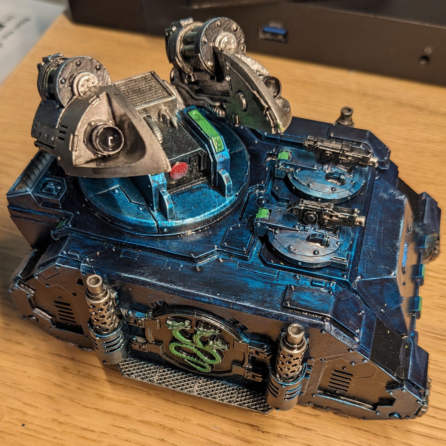 Scorpius Missile Tank from the Horus Heresy setting painted in blue of the Alpha Legion.