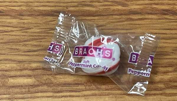 A Brach's soft peppermint candy in it's wrapper