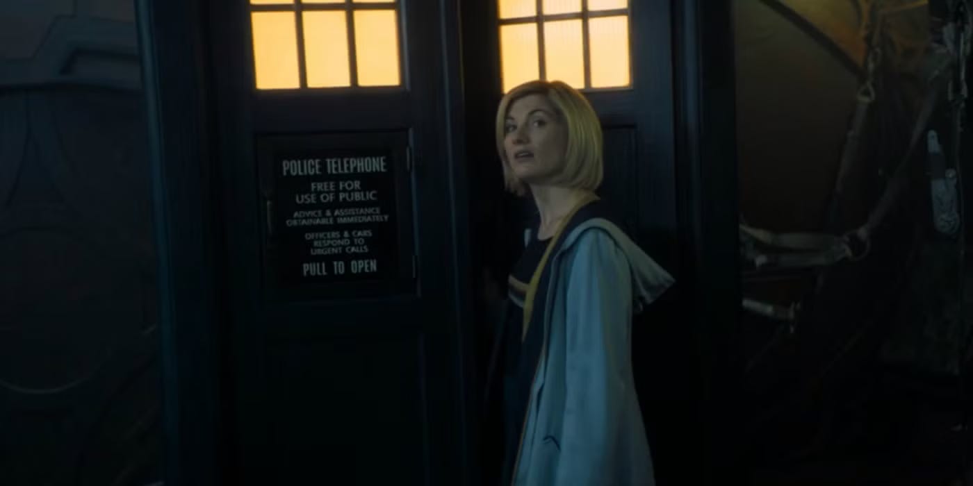 This image from the final scene of "The Battle of Ranskoor Av Kolos" (Doctor Who Series 11's tenth episode and season finale) shows the Thirteenth Doctor (played by Jodie Whittaker) about to enter the TARDIS through its slightly open door. She faces camera, speaking to the offscreen Ux characters Andinio and Delph. This image from the final scene of "The Battle of Ranskoor Av Kolos" (Doctor Who Series 11's tenth episode and season finale) shows the Thirteenth Doctor (played by Jodie Whittaker) about to enter the TARDIS through its slightly open door. She faces camera, speaking to the offscreen Ux characters Andinio and Delph.