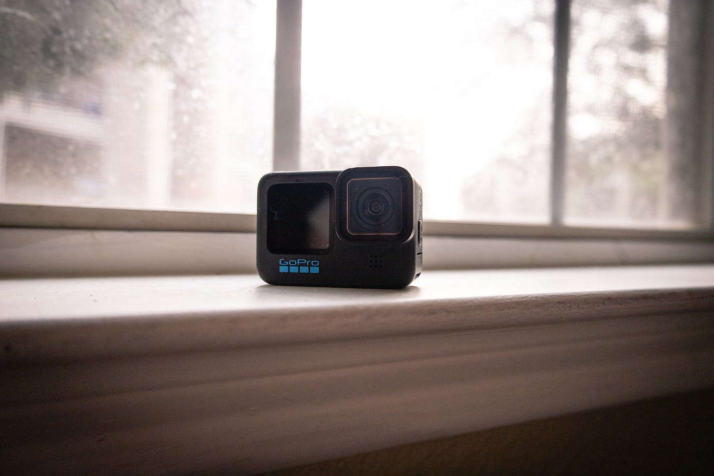 GoPro HERO10 Black action camera sitting on a windowsill, symbolizing declining relevance and fading popularity in the tech market. GoPro HERO10 Black action camera sitting on a windowsill, symbolizing declining relevance and fading popularity in the tech market.