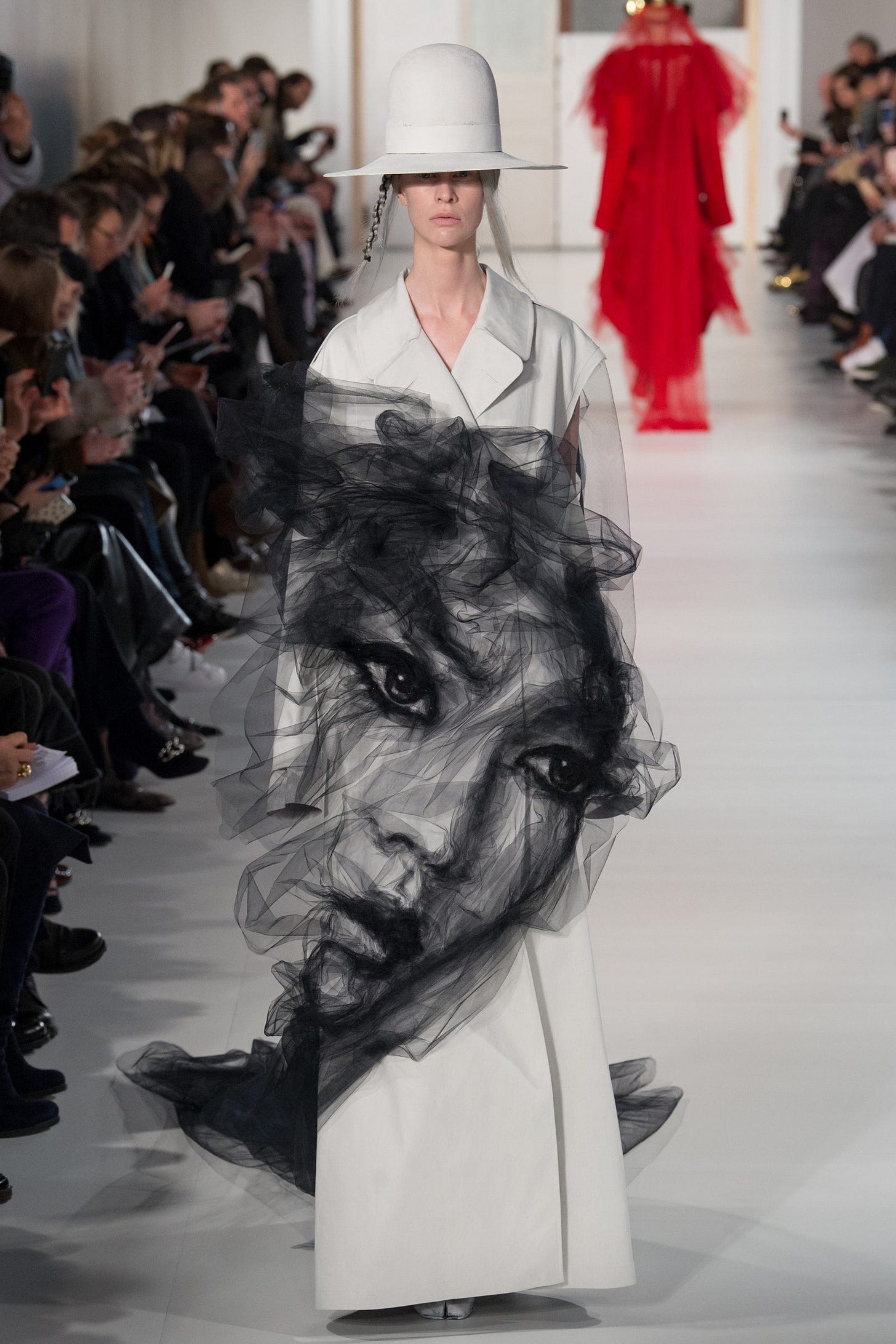 This image may contain Human Person Clothing Apparel Runway Fashion and Female