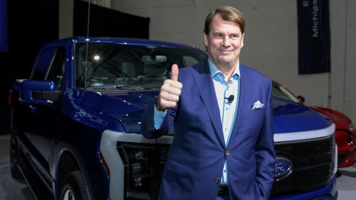 Ford Motor Co., CEO Jim Farley gives the thumbs up sign before announcing Ford Motor will partner with Chinese-based, Amperex Technology, to build an all-electric vehicle battery plant in Marshall, Michigan, during a press conference in Romulus, Michigan February 13, 2023.