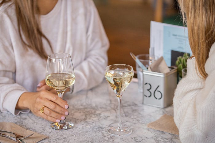 Women drinking wine