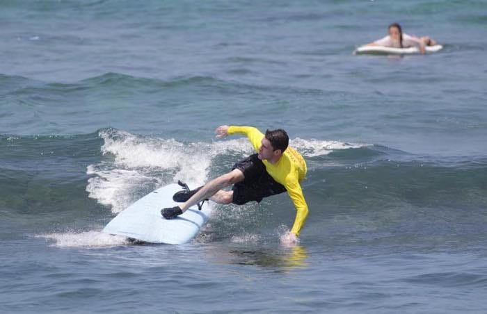 Falling off a surfboard