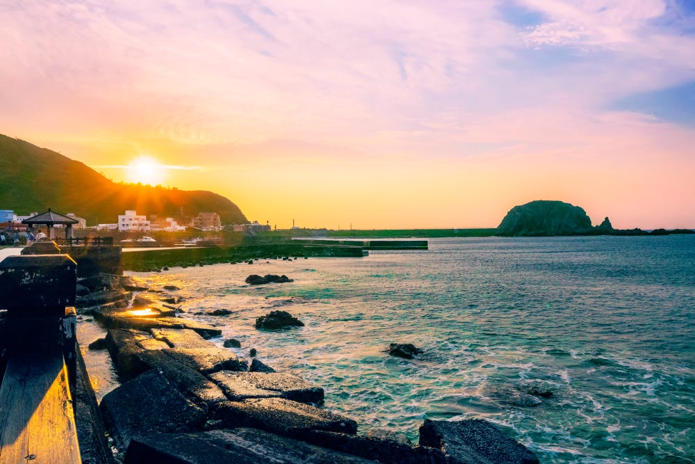 Sunset along the shore at the Human Rights Memorial Park on Taiwan's Green Island (Lyudao 綠島) Sunset along the shore at the Human Rights Memorial Park on Taiwan's Green Island (Lyudao 綠島)