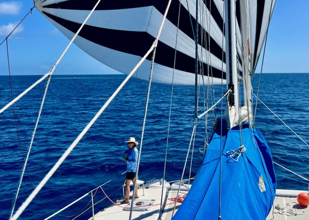 Navigating around the bommies on the spinnaker run from Hirifa to Rotoava. Nothing like a good breeze, flat water, and a spinnaker. Navigating around the bommies on the spinnaker run from Hirifa to Rotoava. Nothing like a good breeze, flat water, and a spinnaker.