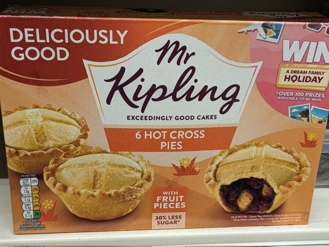 a box of mr kipling hot cross bun flavoured pies