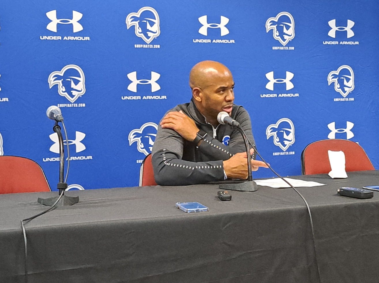 Seton Hall coach Shaheen Holloway speaks to reporters after beating Monmouth on Nov. 9, 2022. (Photo by Adam Zielonka)