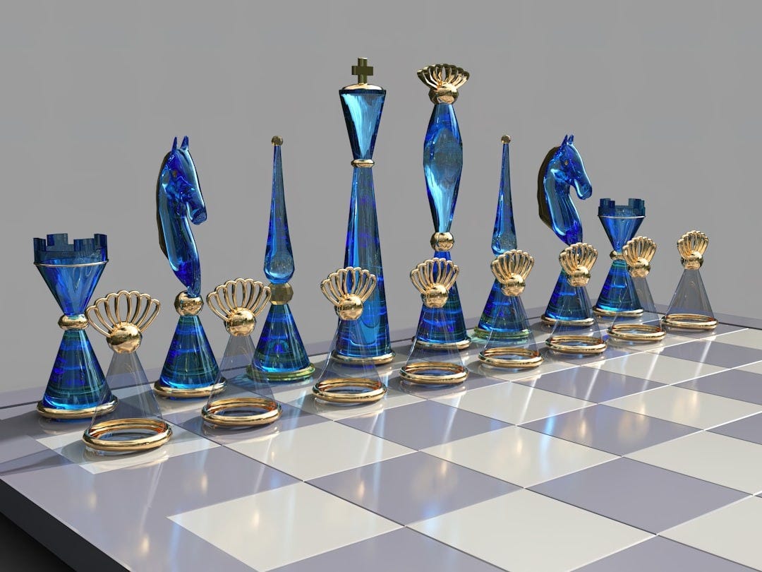 a chess board with blue glass pieces on it a chess board with blue glass pieces on it