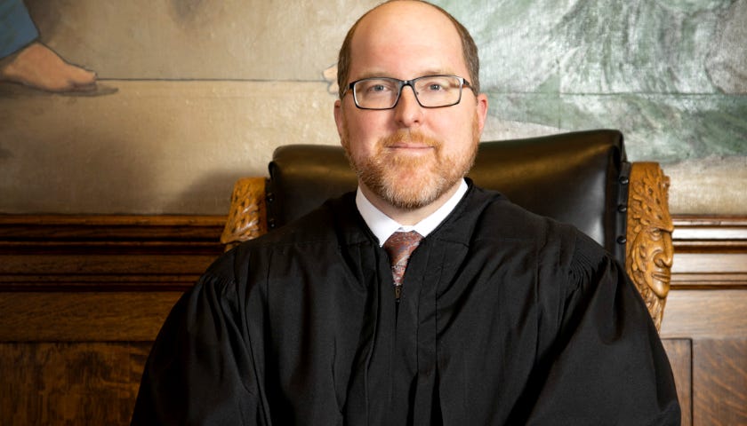 Photo of Judge Jason Marks. 