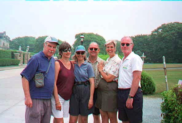 A group of people posing for a photo

Description automatically generated