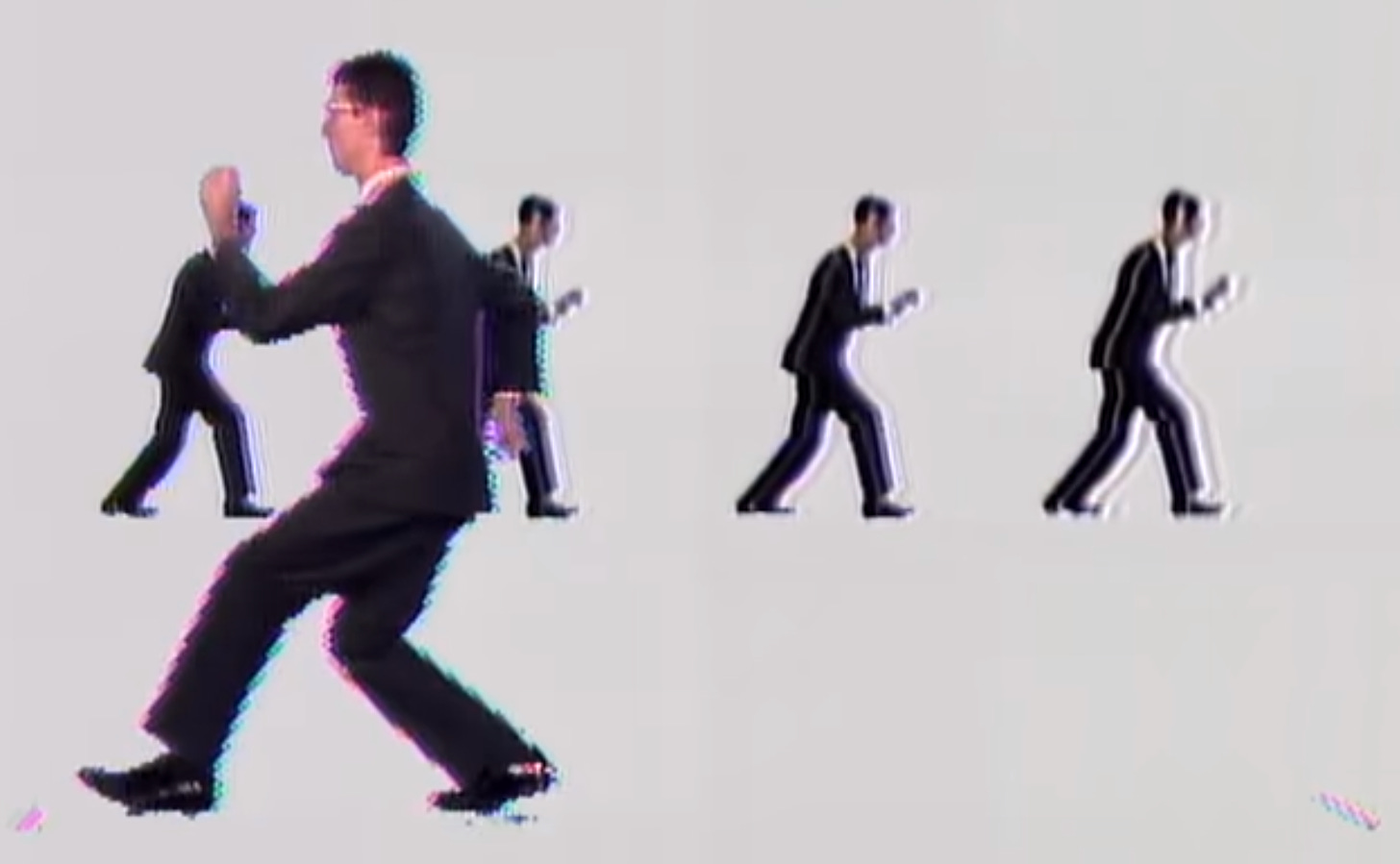 Frame from "Once in a Lifetime" music video by Talking Heads