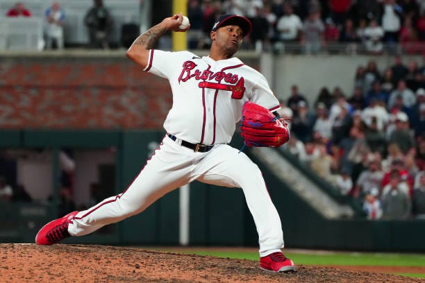 Raisel Iglesias of the Atlanta Braves pitches in the ninth inning during Game 2 of the Division Series between the Philadelphia Phillies and the...