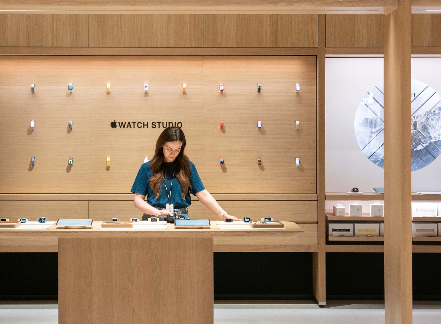 A Specialist stands at the Apple Watch Studio area in Apple Battersea.