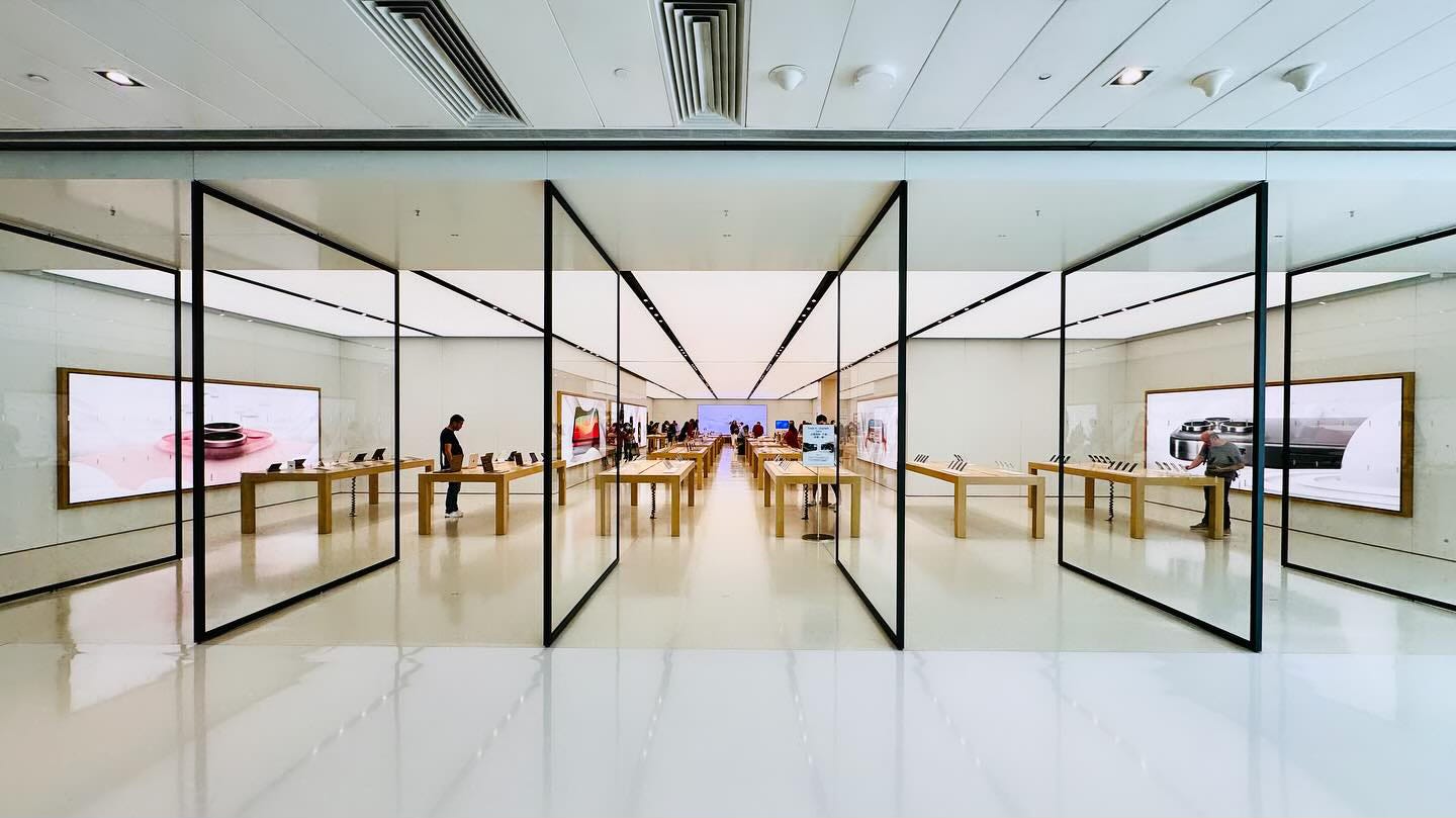 The exterior of Apple New Town Plaza in Hong Kong. The perspective matches that of an Apple hero image.